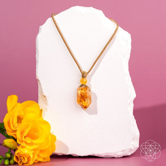 Conscious Items Prosperity Pendant Necklace featuring a delicate pendant with intricate details on a silver chain.