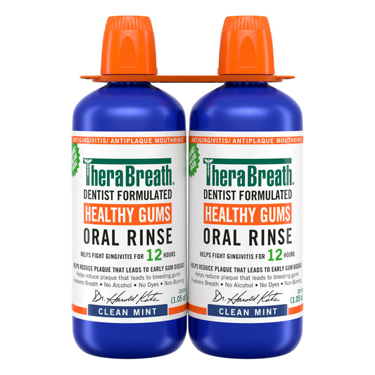 TheraBreath Healthy Gums Oral Rinse bottles, 33.8 fl oz, 2-pack, showing the label and cap on a white background.