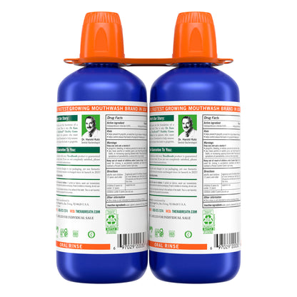 TheraBreath Healthy Gums Oral Rinse bottles, 33.8 fl oz each, in a 2-pack, showing the product label and packaging.