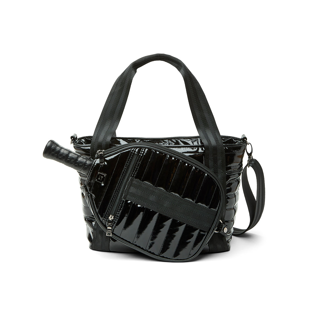 Black patent Ace of the Court pickleball bag by Think Royln, stylish sports bag with multiple compartments and adjustable straps.