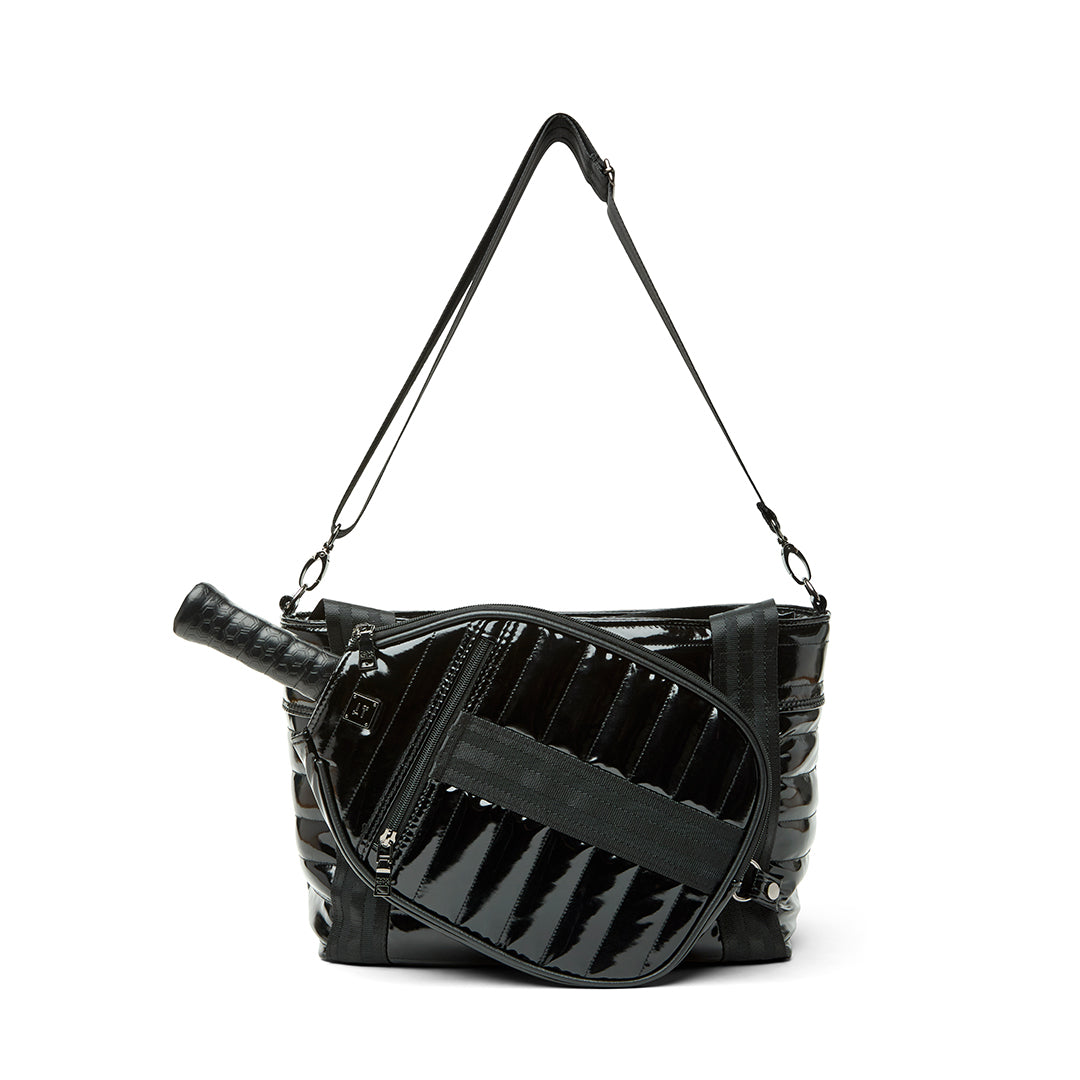 Black patent Ace of the Court pickleball bag by Think Royln, featuring multiple compartments and stylish design for players.