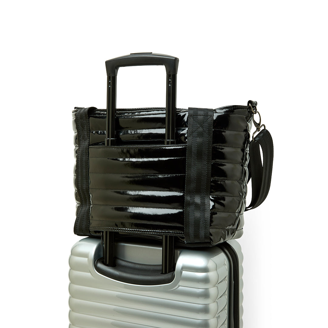 Think Royln Ace of the Court pickleball bag in sleek black patent finish, designed for convenient storage and style.