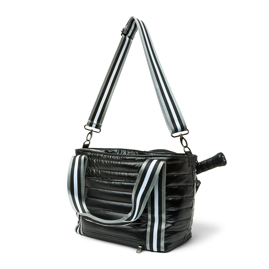 Black patent Ace of the Court pickleball bag by Think Royln with multiple compartments and stylish design.