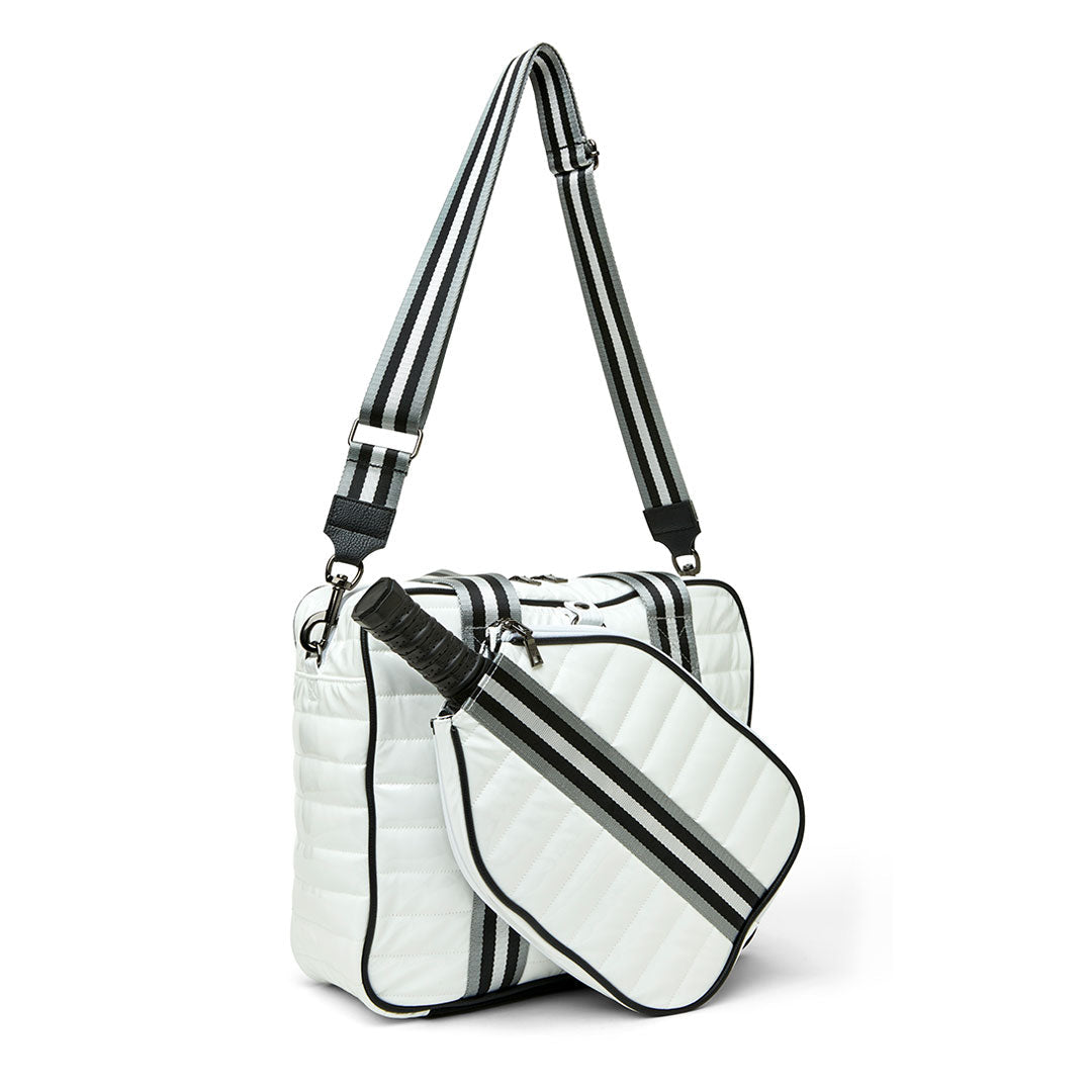 White patent Sporty Spice pickleball bag by Think Royln with sleek design and multiple compartments for sports gear and accessories.