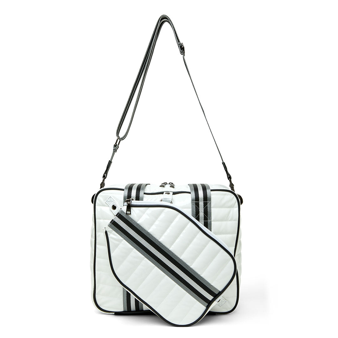 White patent Sporty Spice pickleball bag by Think Royln with multiple compartments and sporty design for easy carrying.