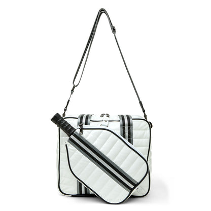 White patent Think Royln Sporty Spice pickleball bag with multiple compartments and sporty design for carrying pickleball gear.