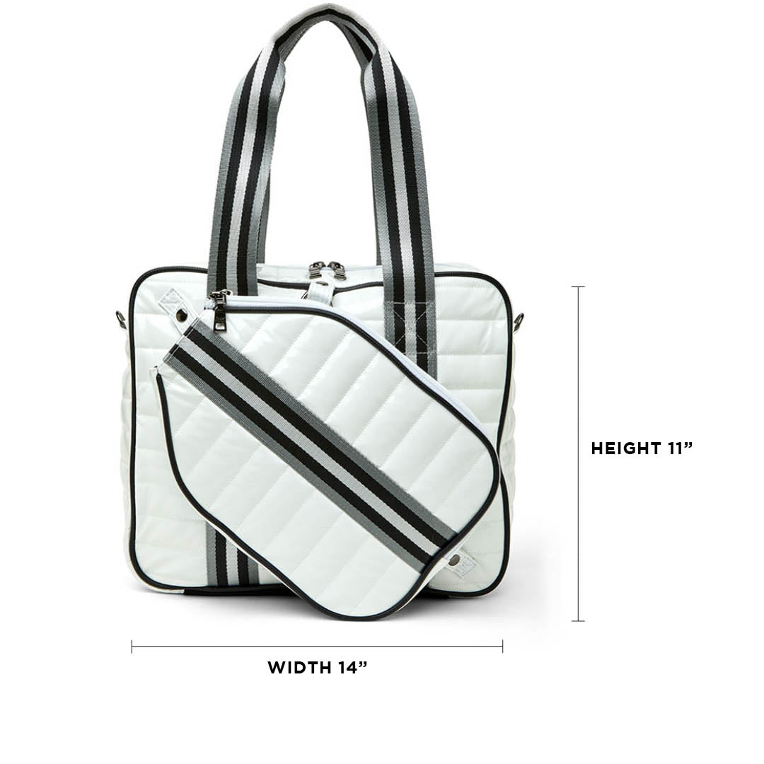 Think Royln Sporty Spice pickleball bag in white patent leather with sporty design, featuring multiple compartments for accessories.
