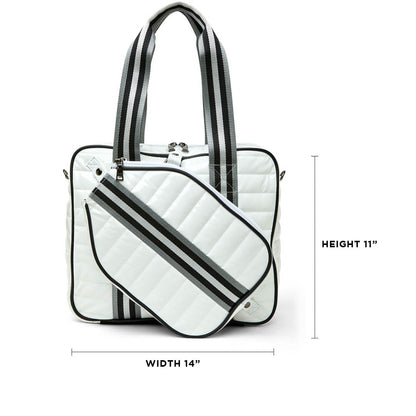 Think Royln Sporty Spice pickleball bag in white patent leather with sporty design, featuring multiple compartments for accessories.