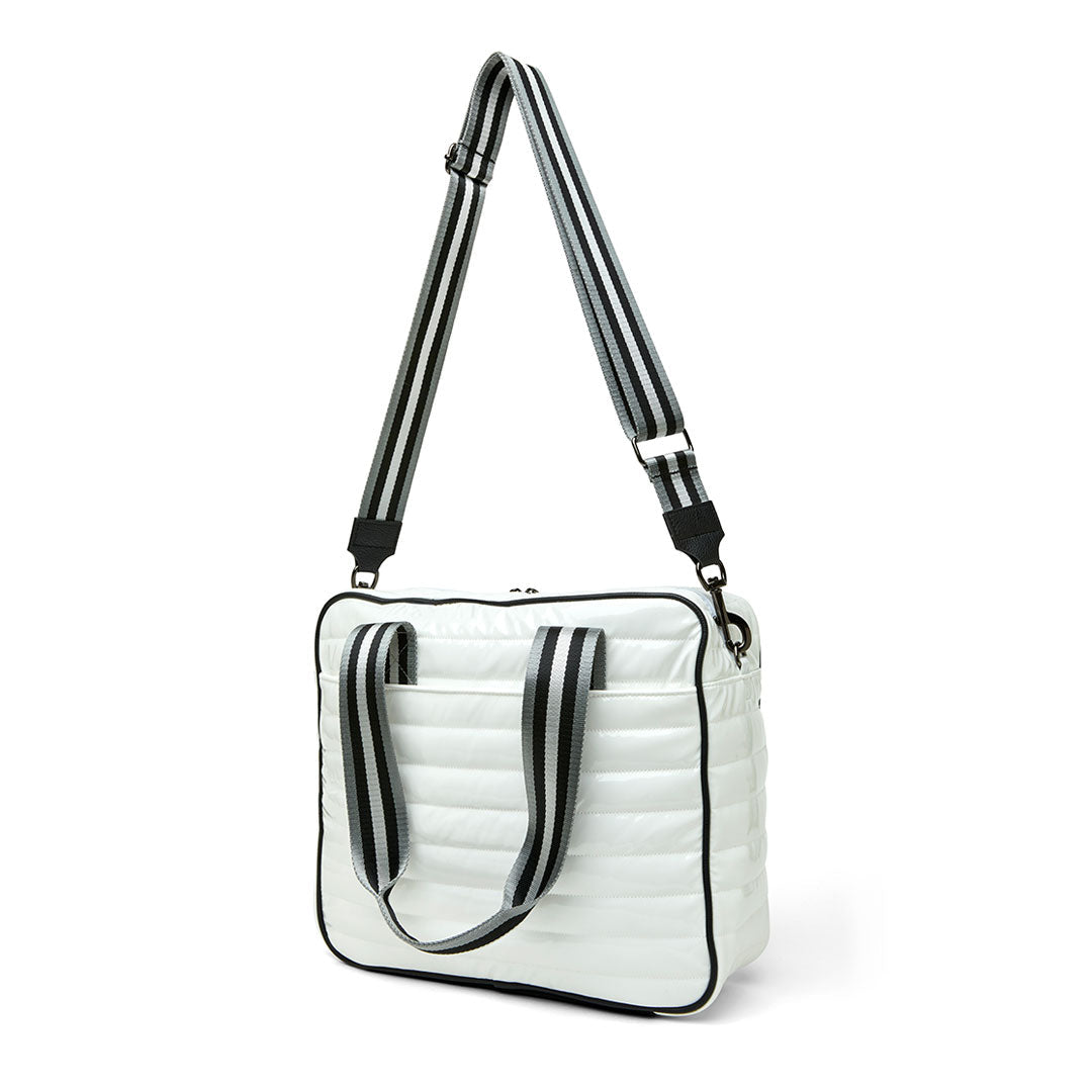 Think Royln Sporty Spice pickleball bag in white patent with sporty design and multiple compartments for gear storage.