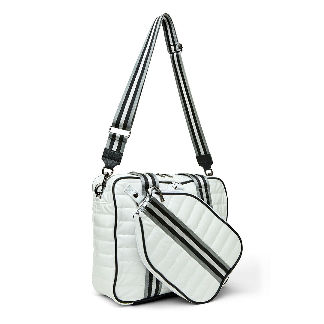White patent Sporty Spice Pickleball Bag by Think Royln with multiple compartments and sporty design.