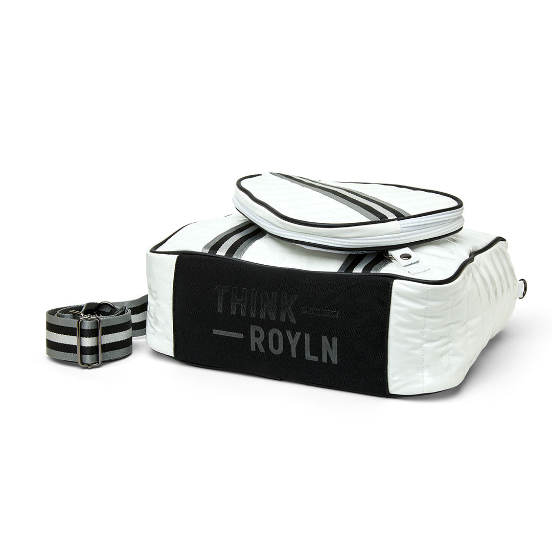 Think Royln Sporty Spice pickleball bag in white patent with sleek design and multiple compartments for sports gear storage.