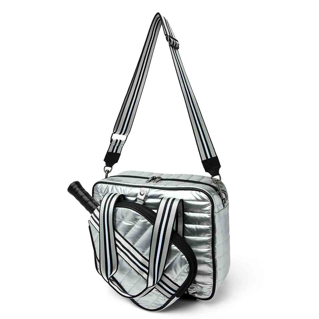 Think Royln Sporty Spice pickleball bag in white patent with sporty design and multiple compartments for accessories and paddles.