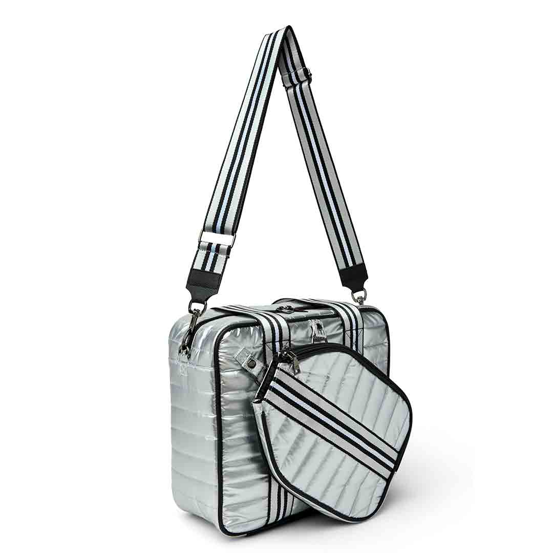 White patent Sporty Spice Pickleball Bag by Think Royln with multiple compartments and sporty design.