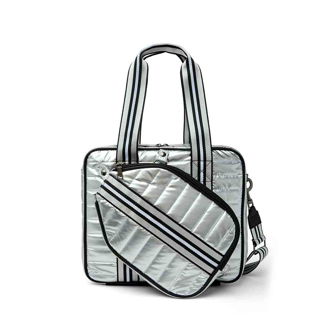 Think Royln Sporty Spice pickleball bag in white patent finish, showcasing its stylish design and spacious storage features.