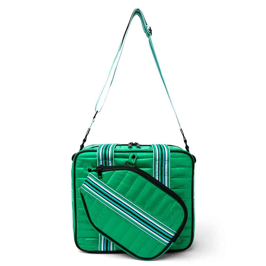 White patent Sporty Spice Pickleball Bag by Think Royln, featuring a sleek design and multiple compartments for sports gear storage.
