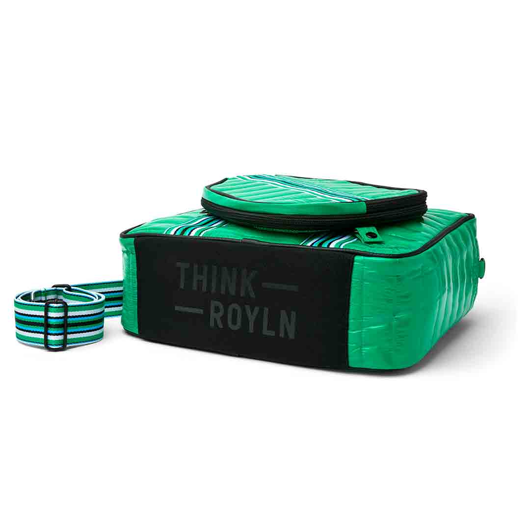 Think Royln Sporty Spice pickleball bag in white patent with sporty design, featuring multiple compartments for accessories and gear.