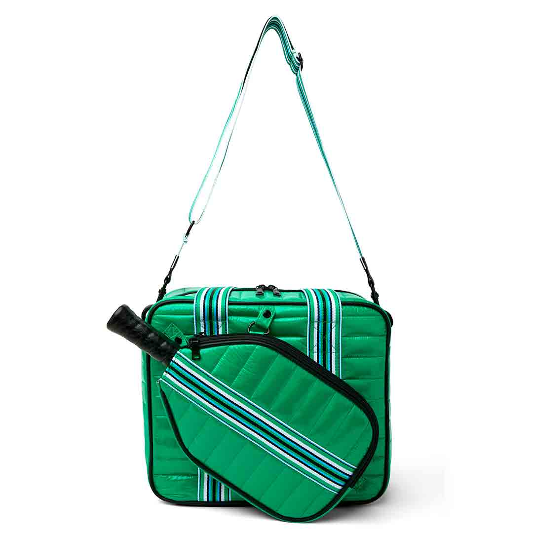 Think Royln Sporty Spice pickleball bag in white patent with sporty design and multiple compartments for accessories and paddles.
