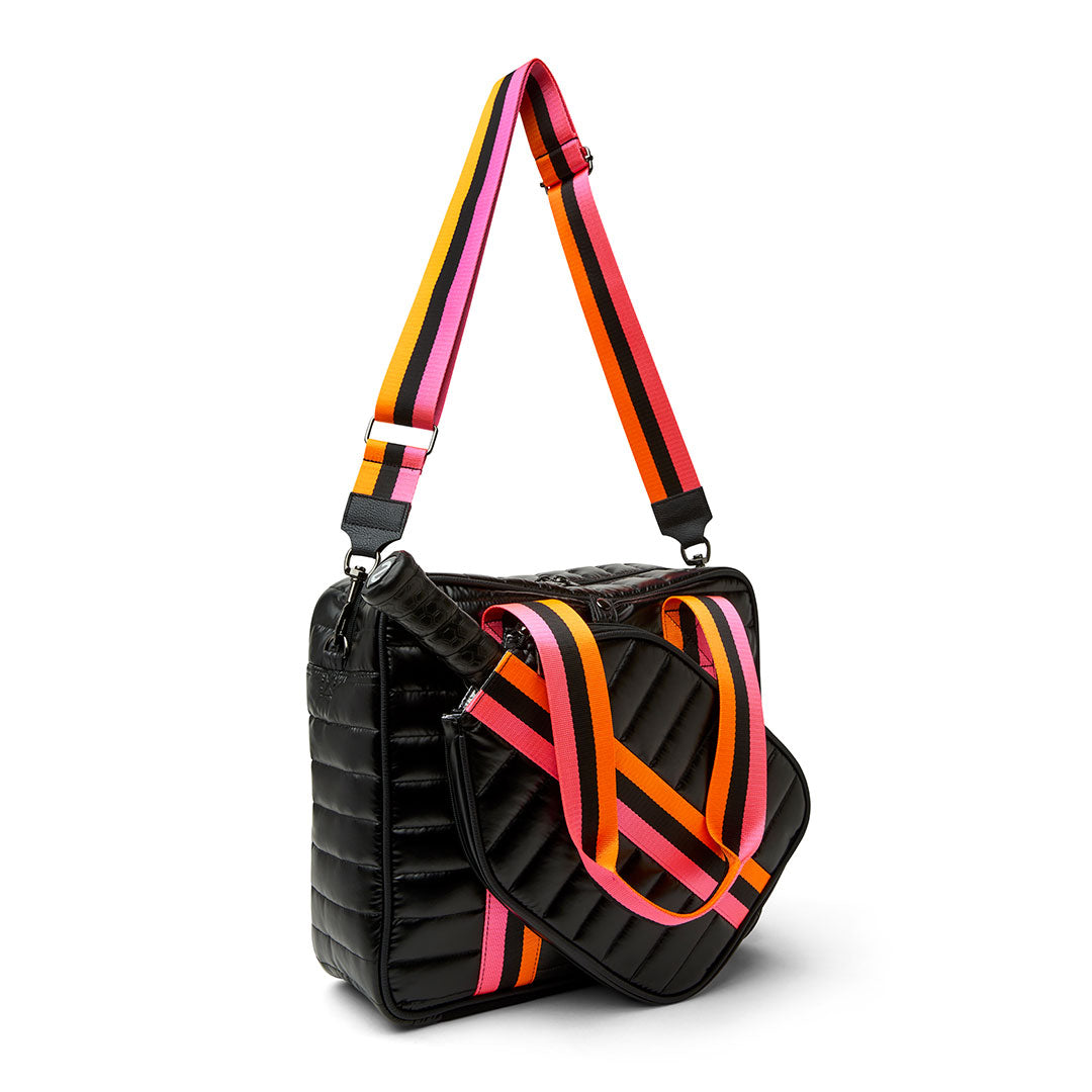 Think Royln Sporty Spice pickleball bag in white patent finish, stylish and spacious for paddles and accessories.