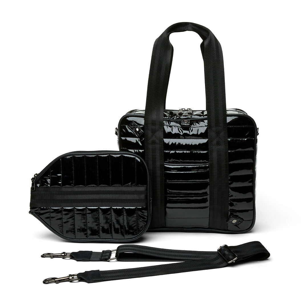 White patent Sporty Spice Pickleball Bag by Think Royln, featuring a sleek design with multiple compartments for sports gear.