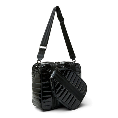 Think Royln Sporty Spice pickleball bag in white patent with sporty design and multiple compartments for accessories and paddles.