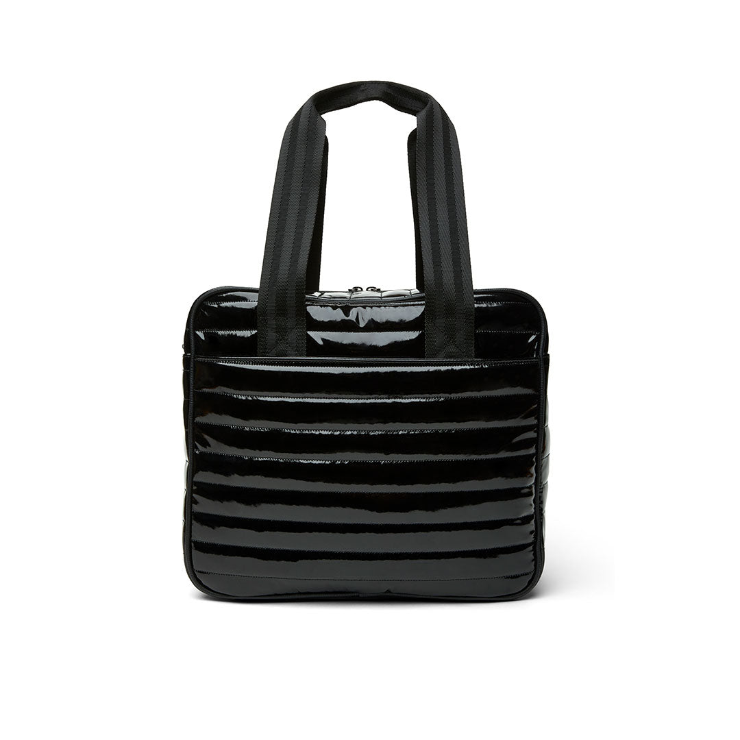 Think Royln Sporty Spice pickleball bag in white patent finish showing its sleek, stylish design with multiple compartments.