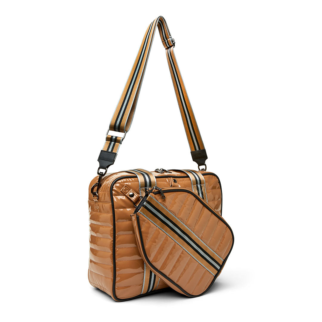 White patent Sporty Spice pickleball bag by Think Royln with multiple compartments and sporty design for active players.