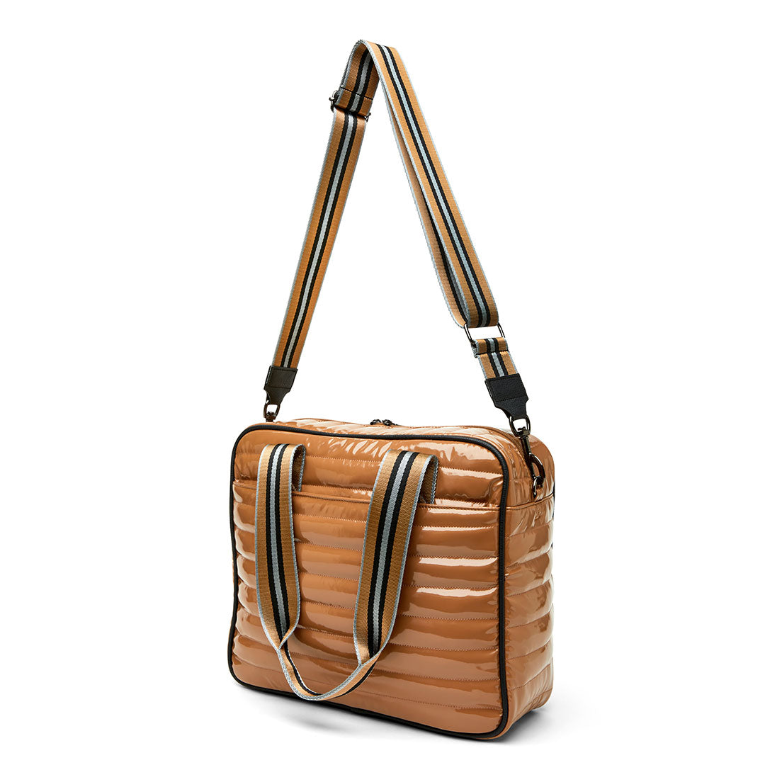 White patent Sporty Spice Pickleball Bag by Think Royln featuring a sporty design and multiple compartments for accessories.