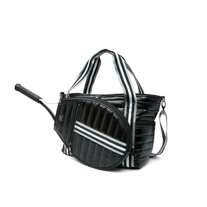 Black patent Love Royln tennis bag by Think Royln featuring a sleek design, spacious compartments, and stylish handles.