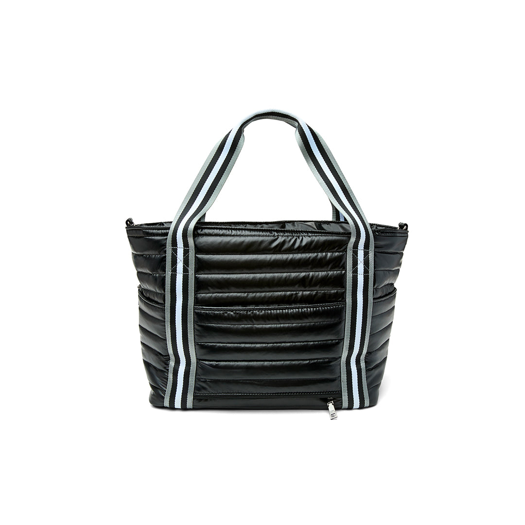 Black patent Love Royln tennis bag by Think Royln with sleek design and spacious compartments for sports and accessories.