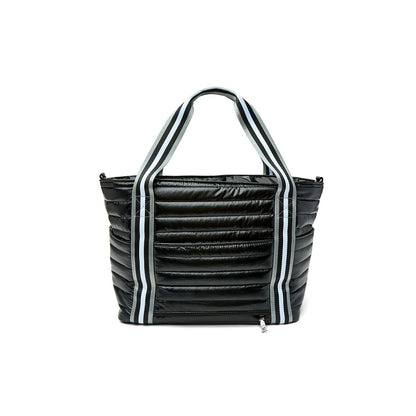 Black patent Love Royln tennis bag by Think Royln with sleek design and spacious compartments for sports and accessories.