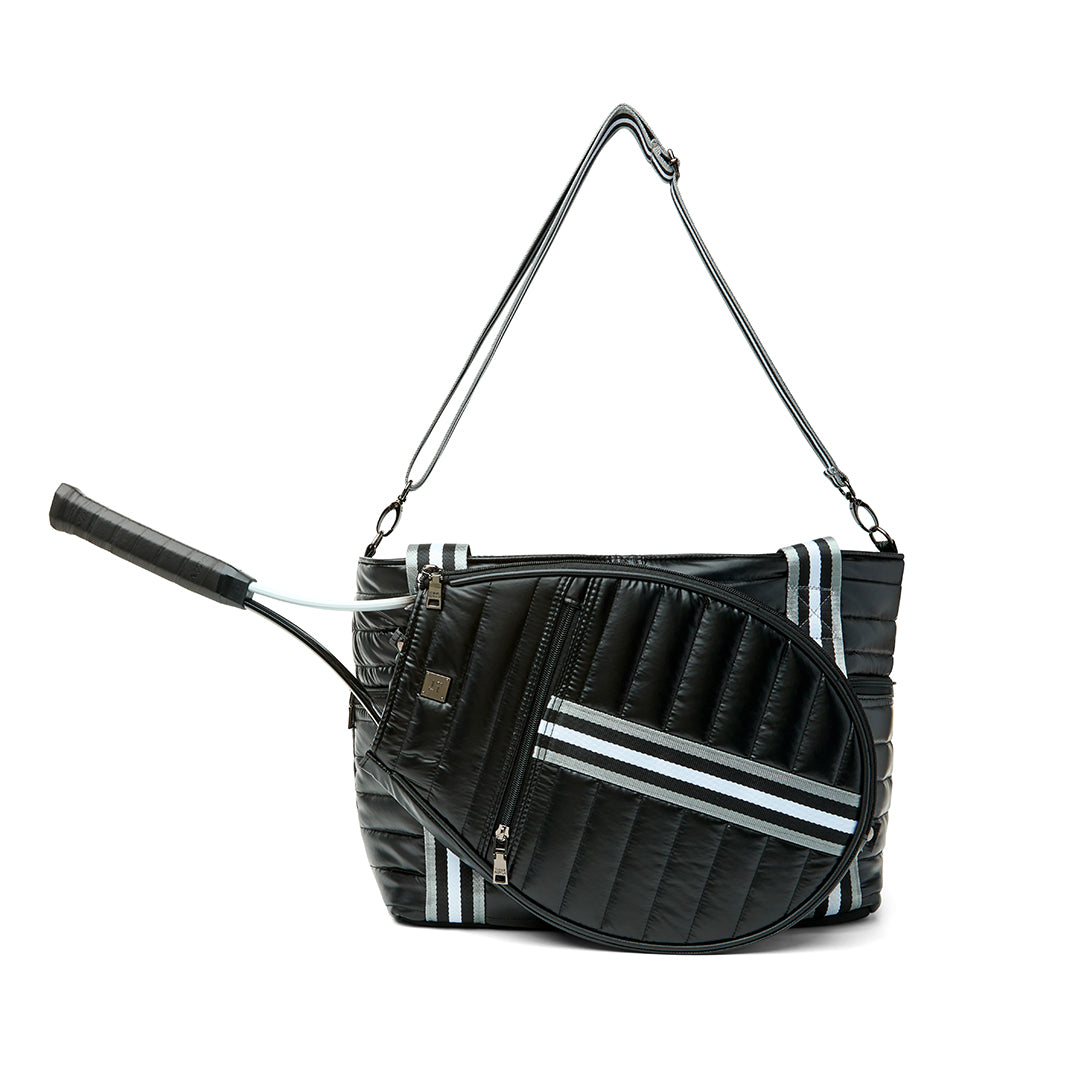 Black patent Love Royln tennis bag by Think Royln with sleek design and spacious interior for tennis gear storage.