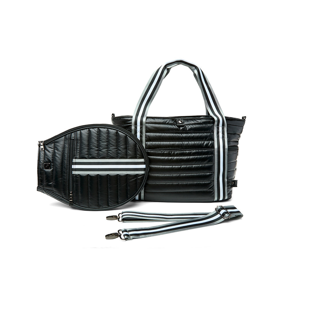 Black patent Love Royln tennis bag by Think Royln with sleek design and spacious interior for tennis gear storage.