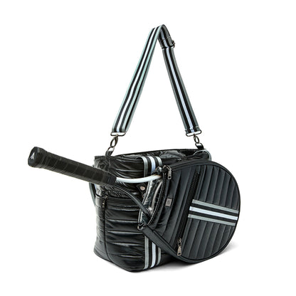 Black patent Love Royln tennis bag by Think Royln with sleek design and spacious compartments, perfect for sports and casual use.