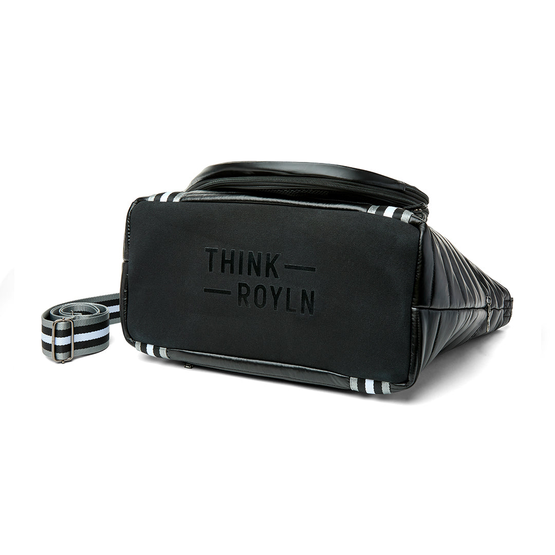 Black patent Love Royln tennis bag by Think Royln with sleek design and multiple compartments for tennis accessories.