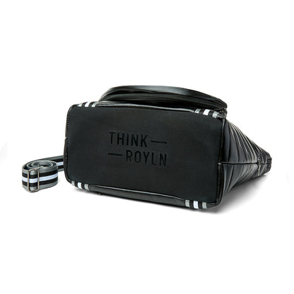 Black patent Love Royln tennis bag by Think Royln with sleek design and multiple compartments for tennis accessories.