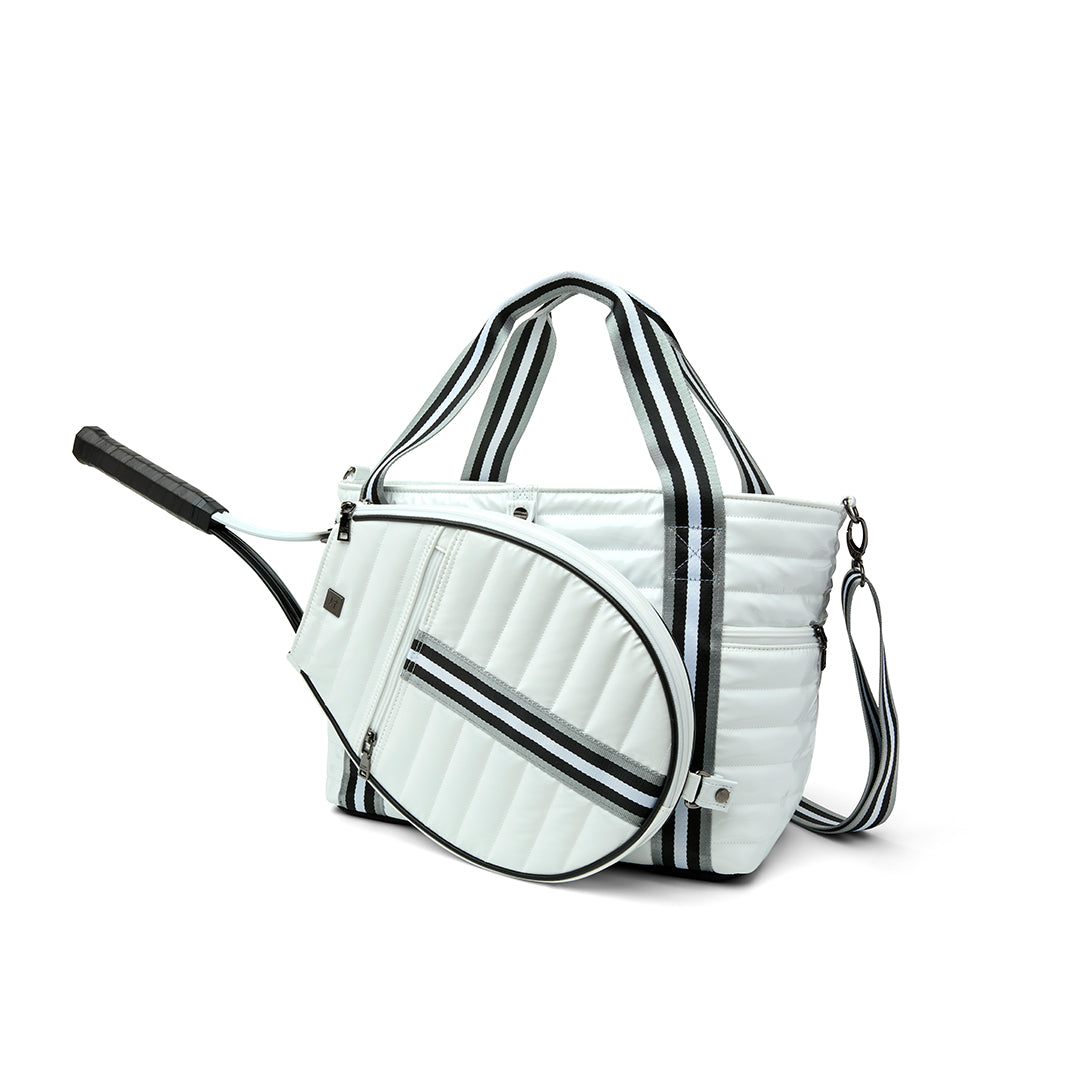 Black patent Love Royln tennis bag by Think Royln with sleek design and multiple compartments for tennis gear.