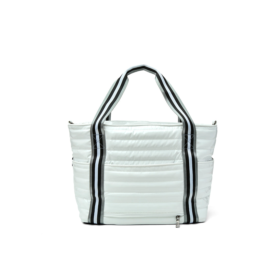 Black patent Love Royln tennis bag by Think Royln with sleek design and multiple compartments for sports gear storage.