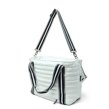 Black patent Love Royln tennis bag by Think Royln with sleek design and storage compartments, ideal for sports and casual use.