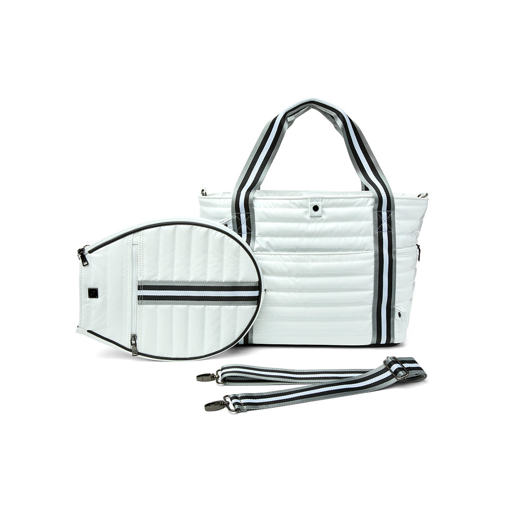 Black patent Love Royln tennis bag by Think Royln with sleek design and spacious interior for tennis gear storage.