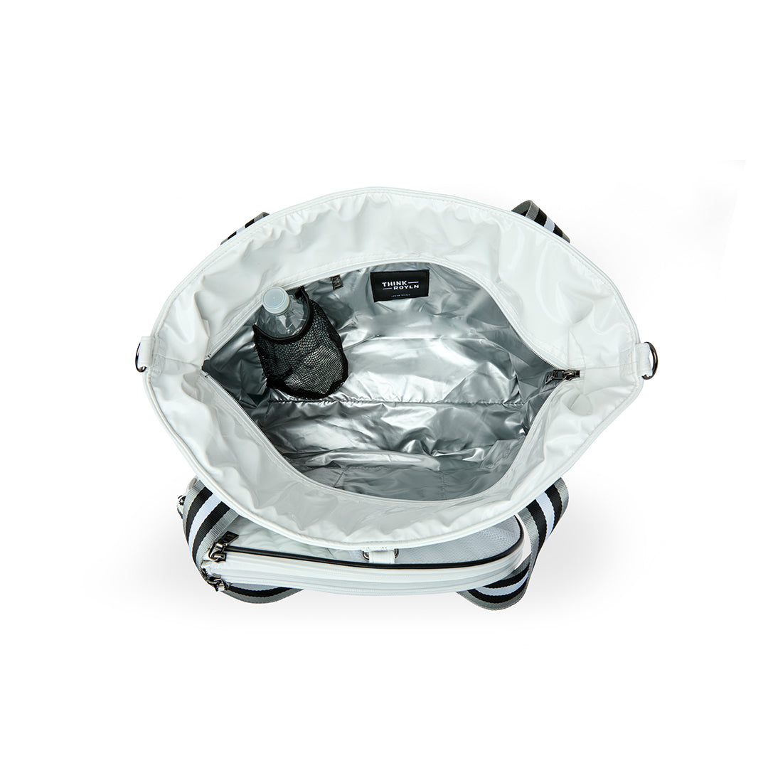Black patent Love Royln tennis bag by Think Royln with dual handles and spacious interior for sports and casual use.