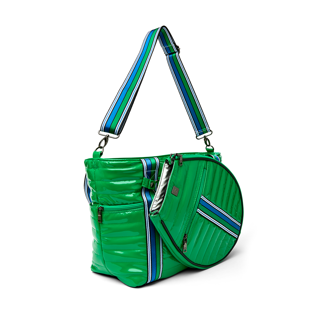 Black patent Love Royln tennis bag by Think Royln with sleek design and spacious interior for sports accessories.