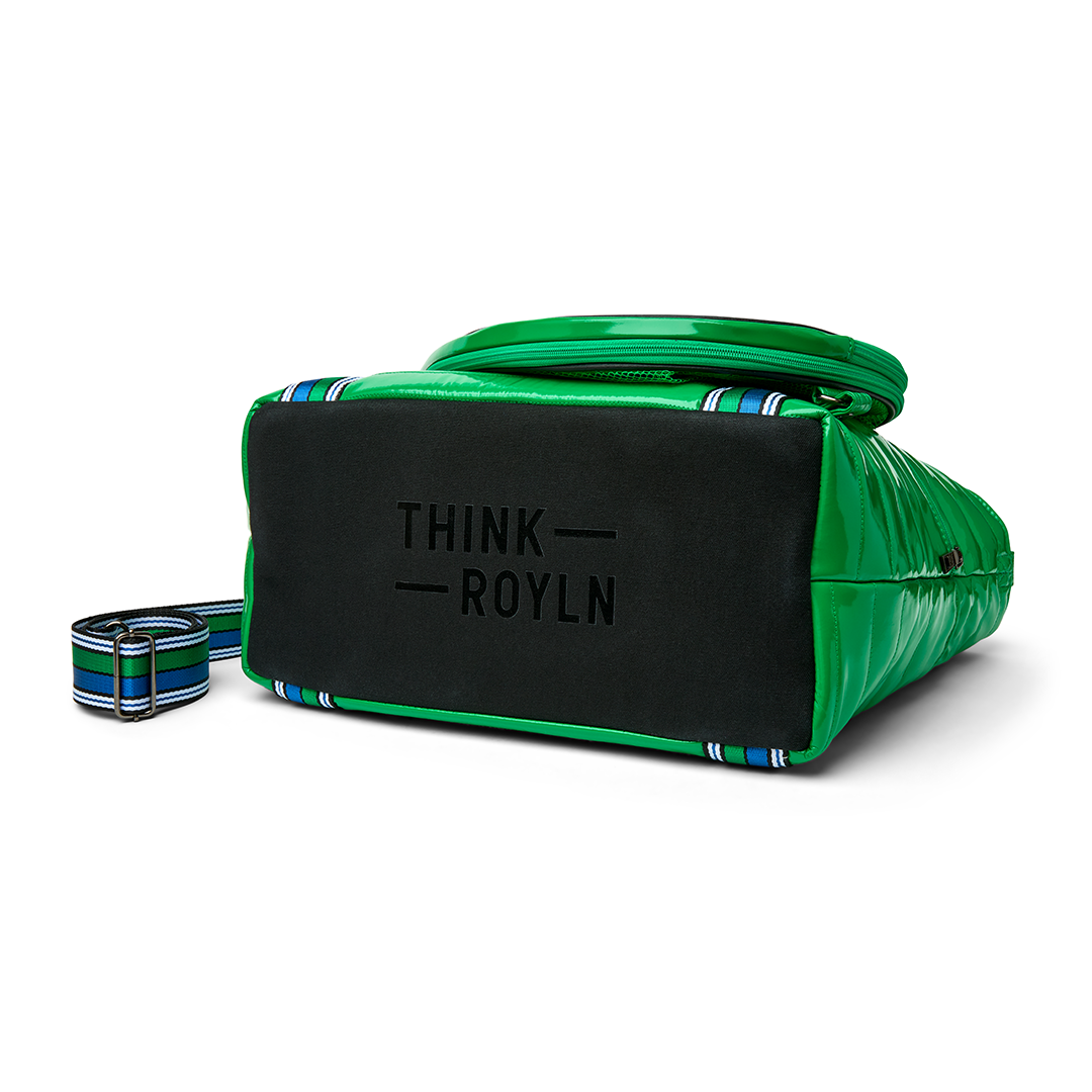 Black patent Love Royln tennis bag by Think Royln with sleek design and spacious interior for tennis gear storage.