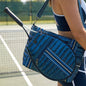 Black patent Love Royln tennis bag by Think Royln with sleek design and multiple compartments, ideal for carrying tennis gear.