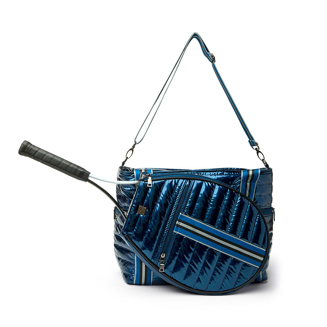 Black patent Love Royln tennis bag by Think Royln with sleek design and spacious compartments for tennis gear.