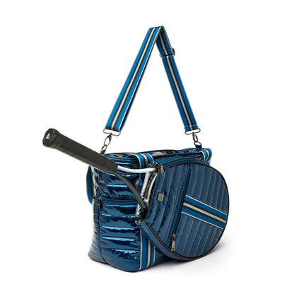 Black patent Love Royln tennis bag by Think Royln with sleek design and spacious interior for tennis gear storage.