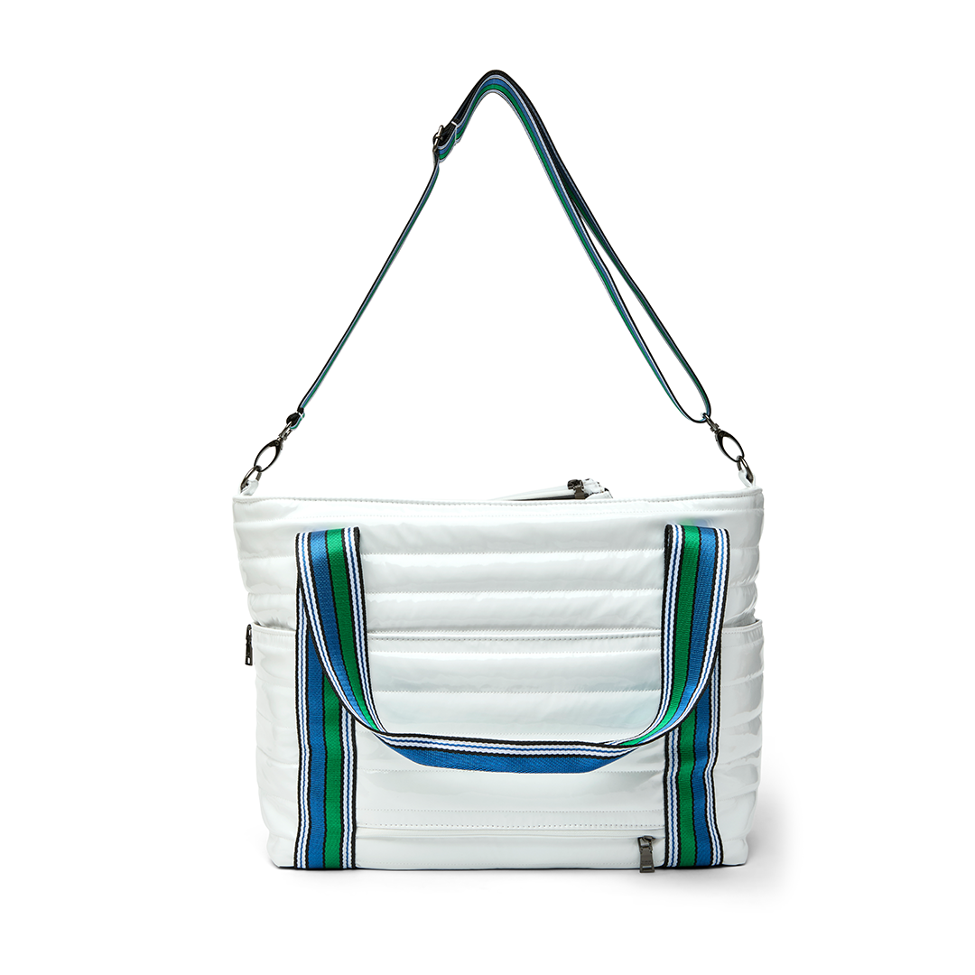 Black patent Love Royln tennis bag by Think Royln with handles and compartments, designed for stylish sports storage.