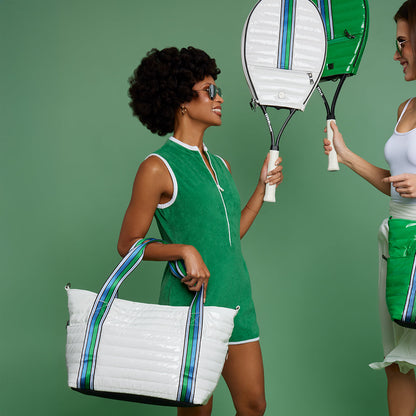 Black patent Love Royln tennis bag by Think Royln with sleek design and multiple compartments for tennis gear.