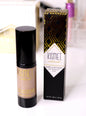 Kismet natural tinted moisturizer with hyaluronic acid, showing smooth, medium-toned application on skin for a dewy finish.
