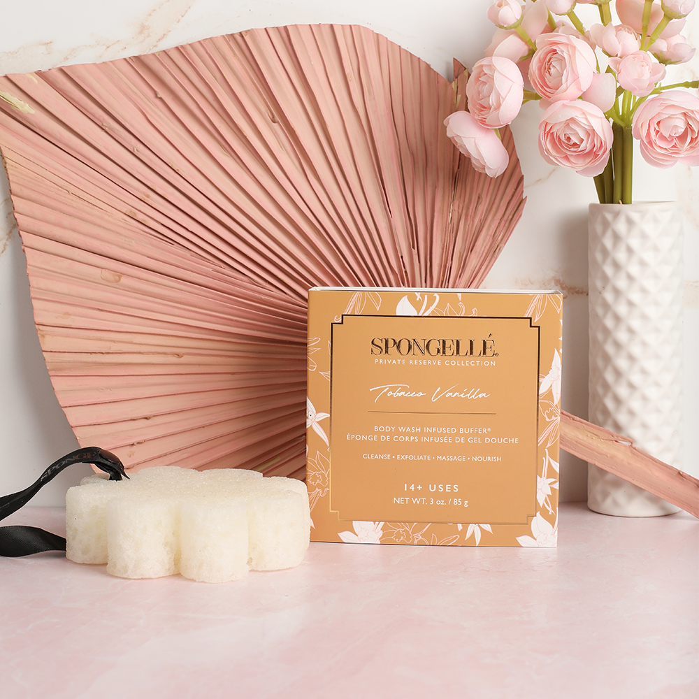 Spongellé Tobacco Vanilla Body Wash Infused Buffer in a boxed floral design, soft texture with tobacco vanilla scent.