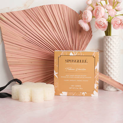 Spongellé Tobacco Vanilla Body Wash Infused Buffer in a boxed floral design, soft texture with tobacco vanilla scent.